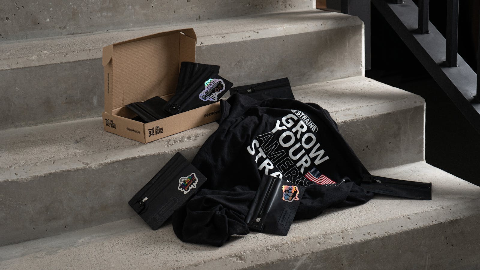 Gardening kits and seeds on concrete stairs, promoting urban sustainability.